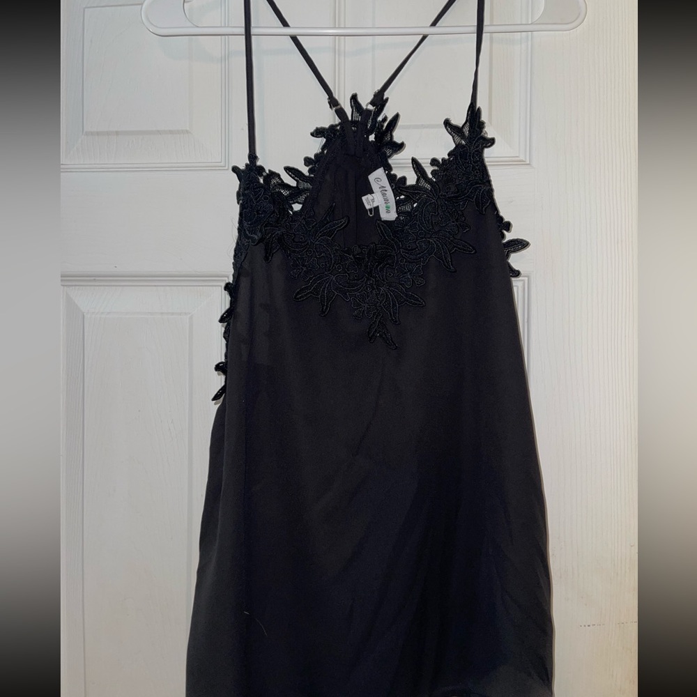Black boutique top: size M